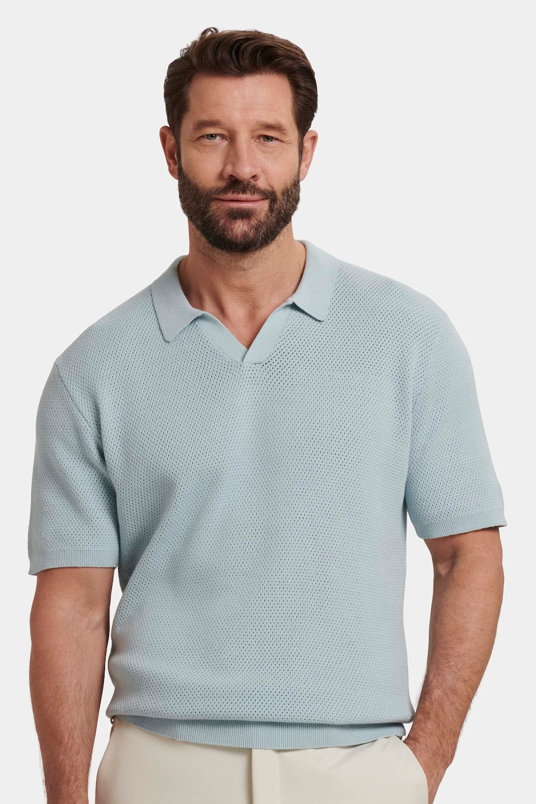 De Capri-polo met korte mouwen