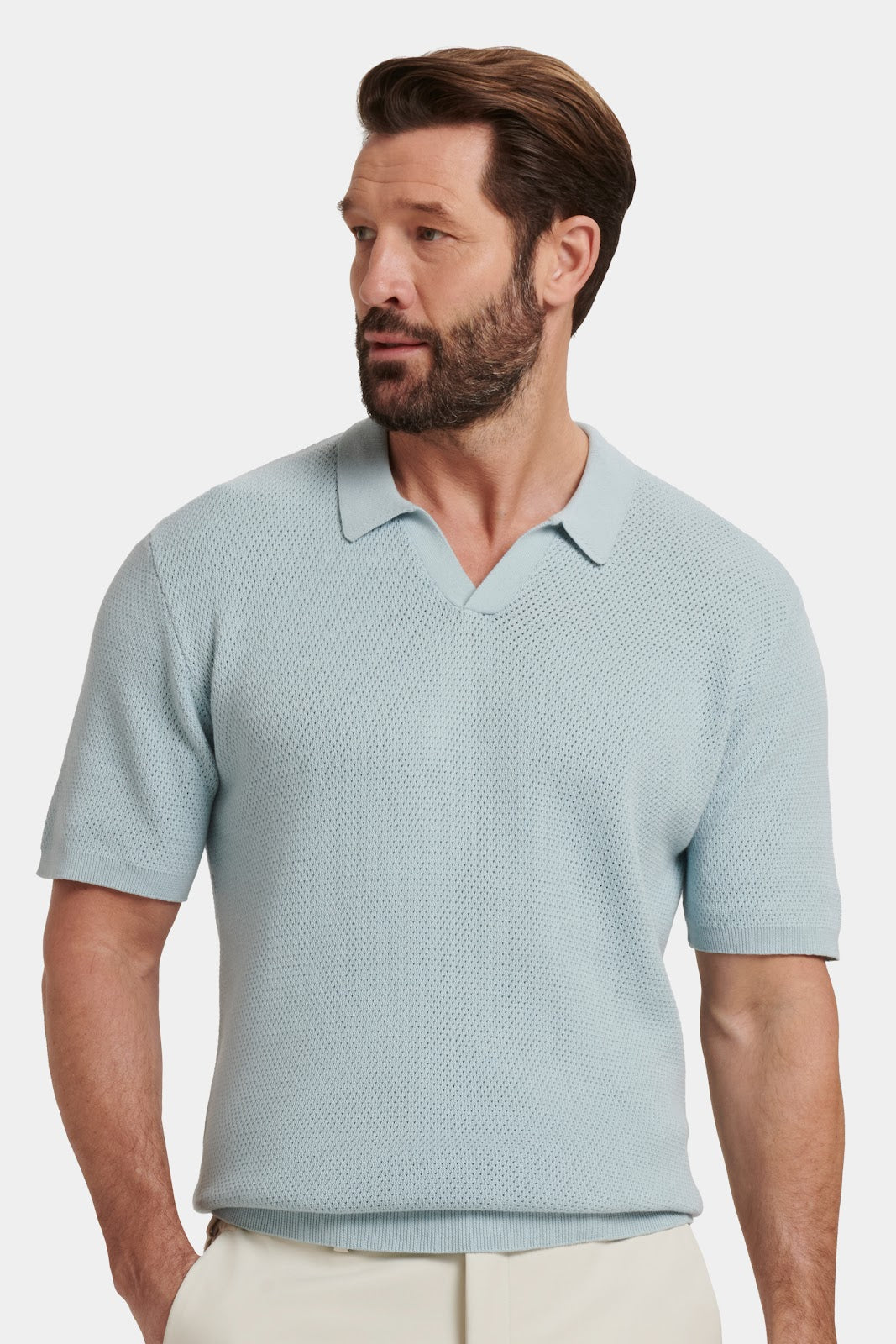 De Capri-polo met korte mouwen